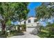 Two-story home with a lush lawn and a paved driveway at 8518 Tidal Bay Ln, Tampa, FL 33635
