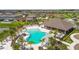 Community pool and clubhouse offer resort-style living in a picturesque setting at 9577 Sandy Bluffs Cir, Parrish, FL 34219