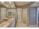 Spacious bathroom features a double vanity, large mirror, and walk-in shower at 960 Starkey Rd # 2405, Largo, FL 33771