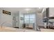 Kitchen featuring stainless appliances, a serving counter and a view from the breakfast bar at 960 Starkey Rd # 2405, Largo, FL 33771