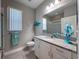 Bathroom featuring a granite vanity, tile flooring, and a toilet at 9814 Palazzo St, Seffner, FL 33584