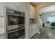 Modern kitchen featuring built-in stainless steel appliances and ample cabinet space at 9814 Palazzo St, Seffner, FL 33584
