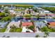 Aerial view of waterfront property with private boat dock and canal access at 9909 San Mateo Way, Port Richey, FL 34668