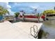 Personal boat lift on the canal with private dock at 9909 San Mateo Way, Port Richey, FL 34668