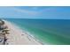 Coastal living with beautiful views of the sandy beach and ocean waters at 10387 Majestic Dr, Largo, FL 33774
