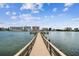 Scenic pier offering stunning waterfront views and a tranquil spot for leisurely strolls and relaxation at 10387 Majestic Dr, Largo, FL 33774