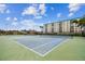 Well-maintained community tennis court provides opportunities for active recreation and social enjoyment at 10387 Majestic Dr, Largo, FL 33774