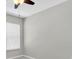 A light and airy bedroom with a window and ceiling fan at 11617 Colony Lake Dr, Tampa, FL 33635