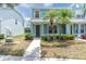 Charming townhouse with palm trees and inviting front walkway at 11617 Colony Lake Dr, Tampa, FL 33635