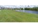 Great view of the pond and lawn from the community at 11617 Colony Lake Dr, Tampa, FL 33635