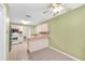 Spacious dining area with a view into the adjacent kitchen at 11816 Cedarfield Dr, Riverview, FL 33579