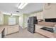 Eat-in kitchen featuring stainless steel appliances and ample cabinet space at 11816 Cedarfield Dr, Riverview, FL 33579