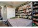 Fun bedroom with dinosaur and stuffed animal decor, closet, and dark wood floors at 1403 W Pradera Ave, Tampa, FL 33612
