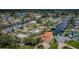 Aerial view of waterfront homes with lush landscaping and boat docks at 1427 40Th Ne Ave, St Petersburg, FL 33703