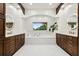 Stunning bathroom featuring a soaking tub with a view and dual vanities at 1427 40Th Ne Ave, St Petersburg, FL 33703