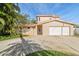Stunning two-story home with a red tile roof, a gated courtyard entry, and an attached two-car garage at 1427 40Th Ne Ave, St Petersburg, FL 33703