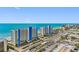 Beautiful aerial view of ocean front condo towers, landscaped grounds and scenic beachfront in prime location at 14950 Gulf Blvd # 905, Madeira Beach, FL 33708