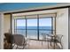 Relaxing ocean view from the balcony, furnished with seating, perfect for enjoying the coastal breeze at 14950 Gulf Blvd # 905, Madeira Beach, FL 33708