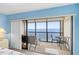 Relaxing balcony view from the bedroom with seating, and ocean view at 14950 Gulf Blvd # 905, Madeira Beach, FL 33708