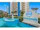 Ocean Sands features a welcome fountain, lush landscaping, and an appealing entrance to this beautiful condo community at 14950 Gulf Blvd # 905, Madeira Beach, FL 33708