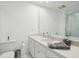 Bright bathroom features a sleek vanity, ample counter space, and a well-lit mirror for a clean and modern aesthetic at 16502 Millan De Avila, Tampa, FL 33613