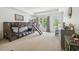 Fun ' bedroom with a bunk bed featuring a slide, creating a playful and adventurous space for children to enjoy at 16502 Millan De Avila, Tampa, FL 33613