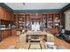 Home office with wood floors, custom built-ins, and stylish decor at 16502 Millan De Avila, Tampa, FL 33613