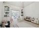 Spacious playroom with built-in shelving, ample storage, and a fun, inviting atmosphere for children to enjoy at 16502 Millan De Avila, Tampa, FL 33613