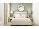 Cozy bedroom with stylish decor, modern furnishings, and a large round mirror at 17554 Happytrails St, Land O Lakes, FL 34638