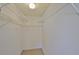Walk-in closet with wire shelving, providing ample storage space at 1904 Canterbury Ln # 18, Sun City Center, FL 33573