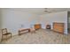 Living room featuring clean, white walls, plank flooring, and traditional furnishings at 1904 Canterbury Ln # 18, Sun City Center, FL 33573