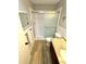Bathroom featuring granite vanity and shower with glass doors at 2262 Swedish Dr # 6, Clearwater, FL 33763