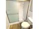Bathroom featuring shower with sliding glass door at 2262 Swedish Dr # 6, Clearwater, FL 33763