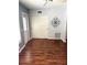 Cozy bedroom featuring a closet and hardwood floors at 2262 Swedish Dr # 6, Clearwater, FL 33763