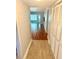 Inviting hallway with hardwood floors and ample closet space at 2262 Swedish Dr # 6, Clearwater, FL 33763