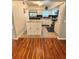 Modern kitchen featuring white cabinets, stainless appliances, and granite countertops at 2262 Swedish Dr # 6, Clearwater, FL 33763