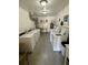Bright community laundry room featuring rows of clean, well-maintained washing machines and a utility sink at 2262 Swedish Dr # 6, Clearwater, FL 33763