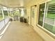Spacious covered patio with a barbecue grill and access to the backyard at 2262 Swedish Dr # 6, Clearwater, FL 33763