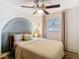 Bright bedroom with designer color scheme and comfortable decor at 27315 Popiel Rd, Brooksville, FL 34602