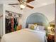 Bright bedroom with designer color scheme, walk-in closet and comfortable decor at 27315 Popiel Rd, Brooksville, FL 34602