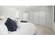 Bright bedroom with closet and an ensuite bathroom at 3004 Conifer Dr, Largo, FL 33771