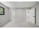Bright, spacious bedroom with an open closet and staircase at 3004 Conifer Dr, Largo, FL 33771