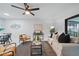 Bright living room featuring modern furnishings and lots of natural light at 3004 Conifer Dr, Largo, FL 33771