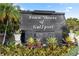 Town Shores of Gulfport sign with lush tropical landscaping at 3114 59Th S St # 203, Gulfport, FL 33707