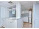 Eat in kitchen features stainless steel appliances and marble countertops at 38839 Miller Ave, Zephyrhills, FL 33542