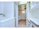 Functional laundry room with washer, dryer, and convenient built-in shelving at 38839 Miller Ave, Zephyrhills, FL 33542