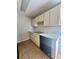 Kitchen showcasing modern countertops, stainless steel sink, ample cabinet space, and sleek appliances at 404 Water St, Plant City, FL 33563