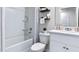 Bright bathroom featuring a tub/shower combo, vanity, and modern fixtures at 4458 Rachel Falls Dr, Tampa, FL 33610