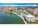 Aerial view of the building, amenities, waterfront, tennis courts and surrounding neighborhood at 4725 Cove Circle # 908, St Petersburg, FL 33708