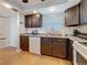 Well-lit kitchen featuring ample counter space and modern appliances at 4725 Cove Circle # 908, St Petersburg, FL 33708